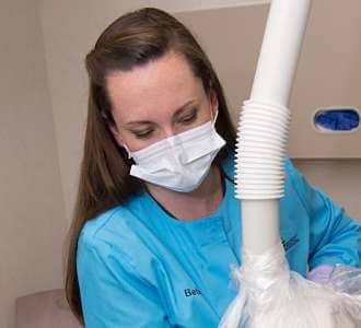 Hygienist checking decay