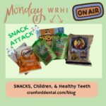 Various kids' snacks in small bags with words "Snack Attack"