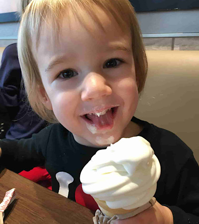 Little girl eating an ice cream cone